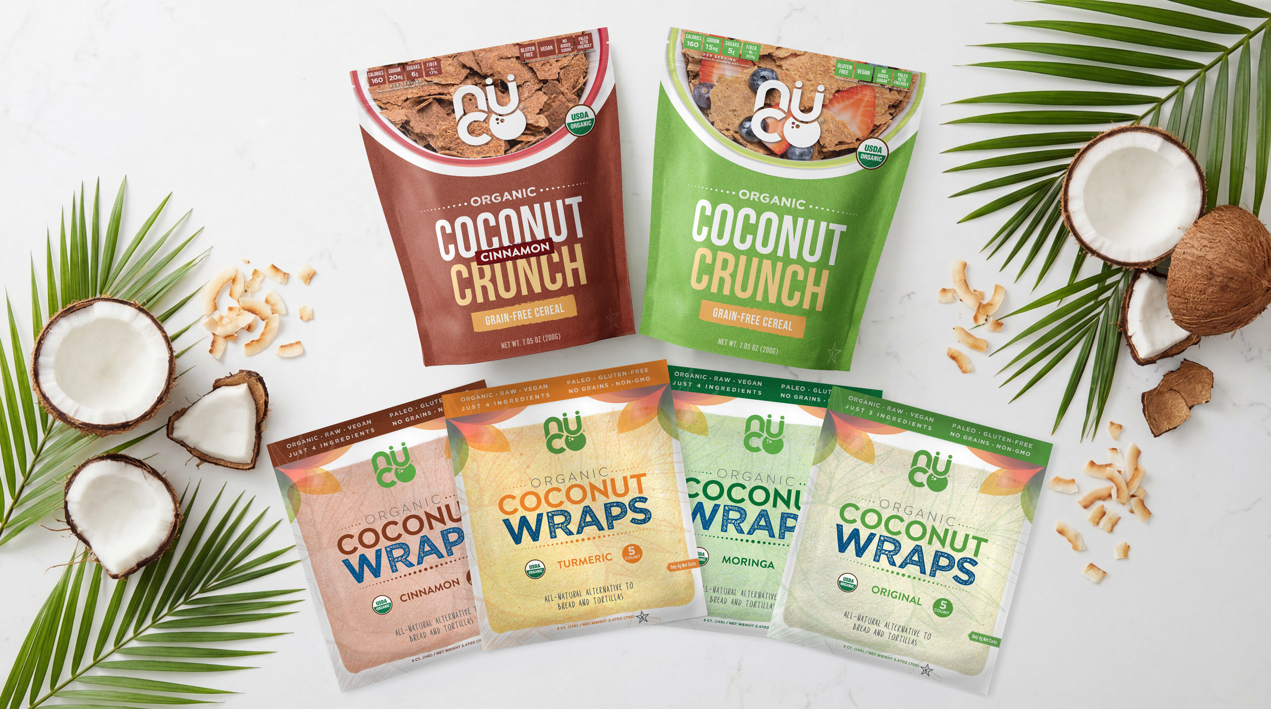 Overhead flat lay of all four NUCO Coconut Wrap flavors
